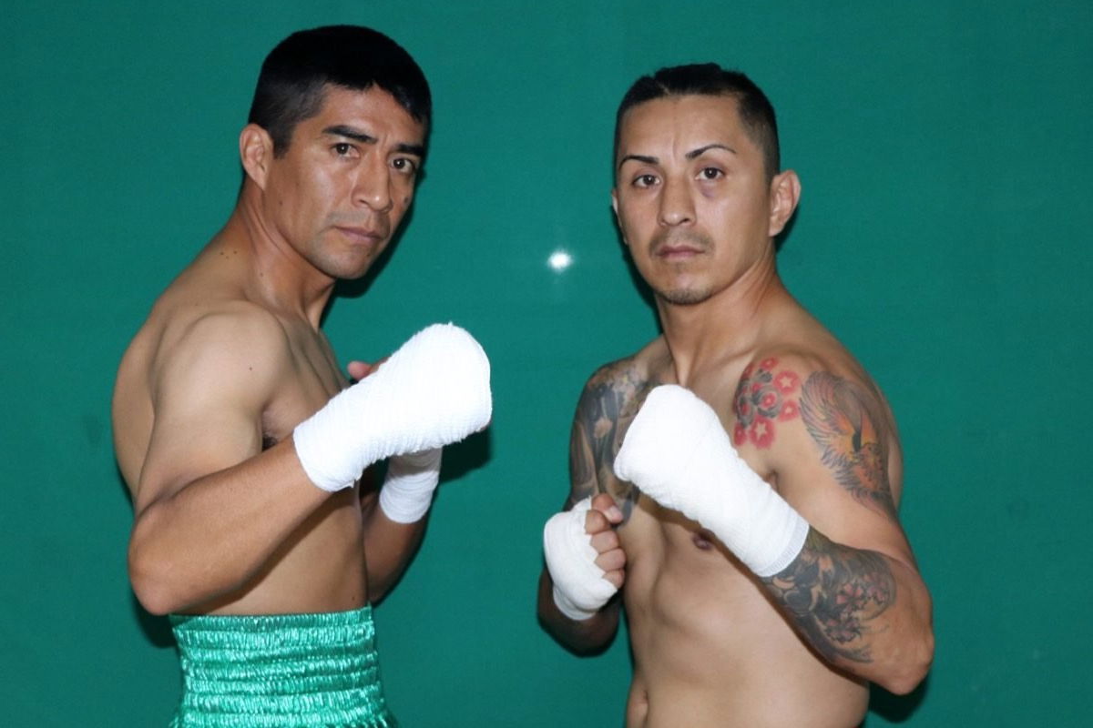 Armando Torres (right) would shock Ganigan Lopez