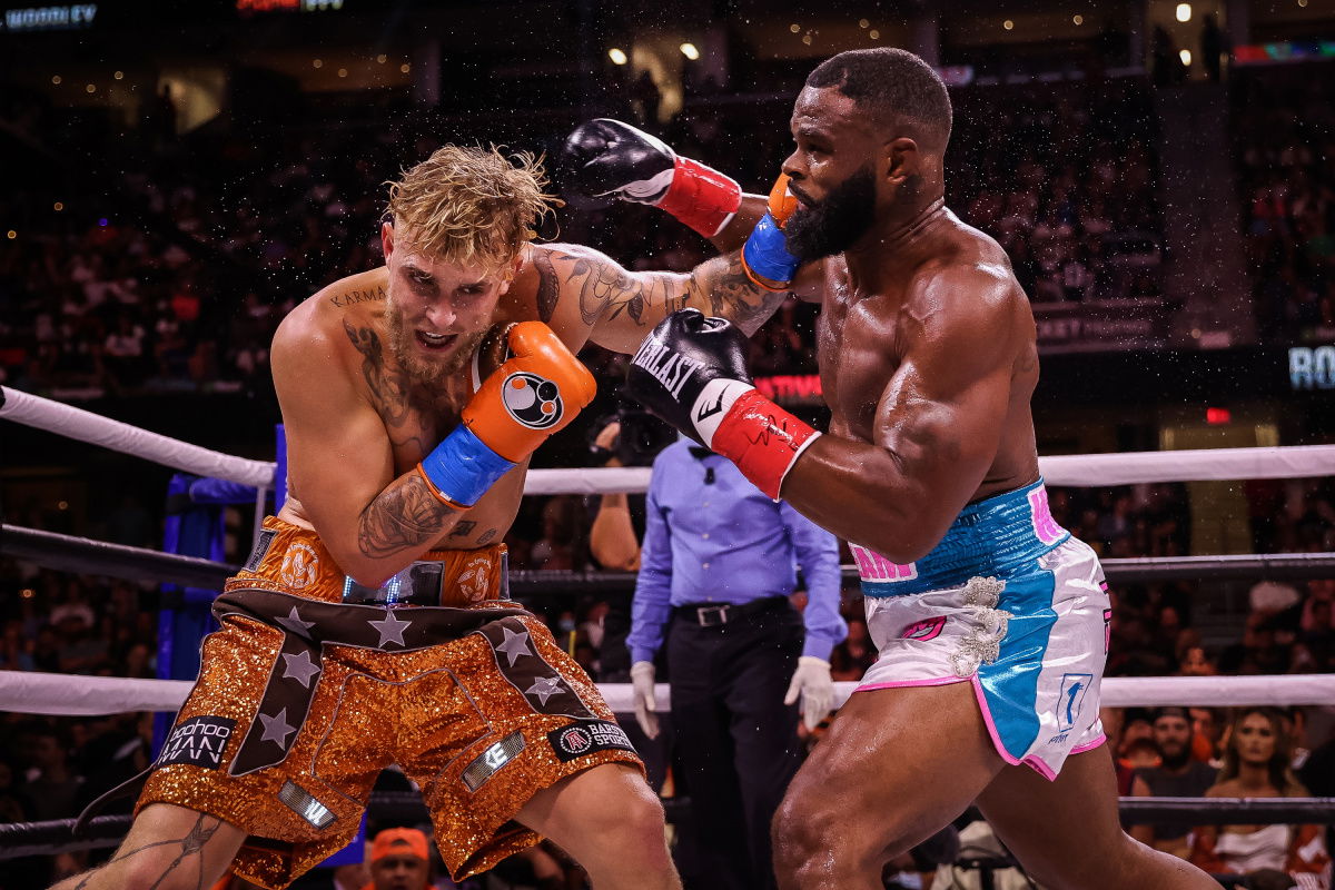 Jake Paul survives big shot and toughest test, against Tyron Woodley